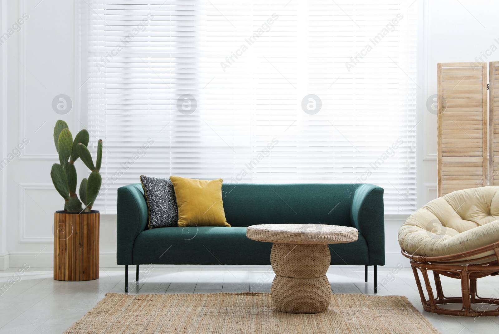 Photo of Comfortable sofa in modern living room. Interior design