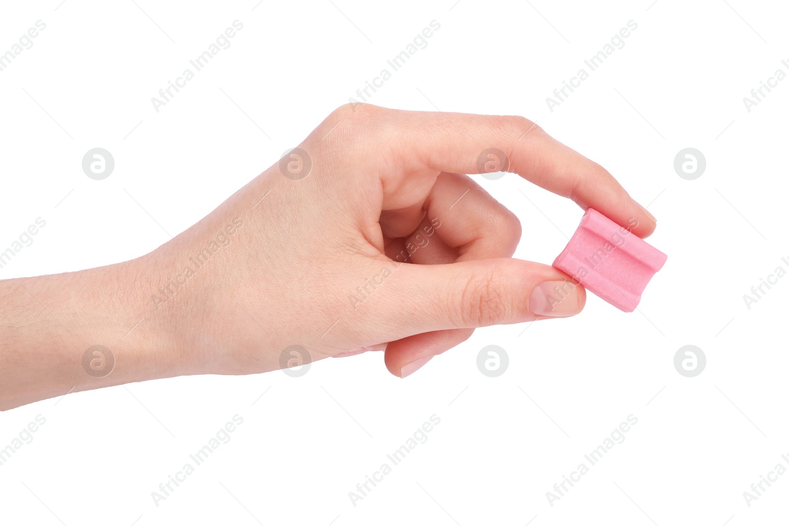 Photo of Woman holding tasty pink chewing gum on white background, top view