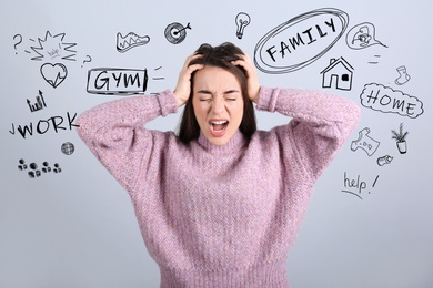 Stressed young woman, text and drawings on light grey background