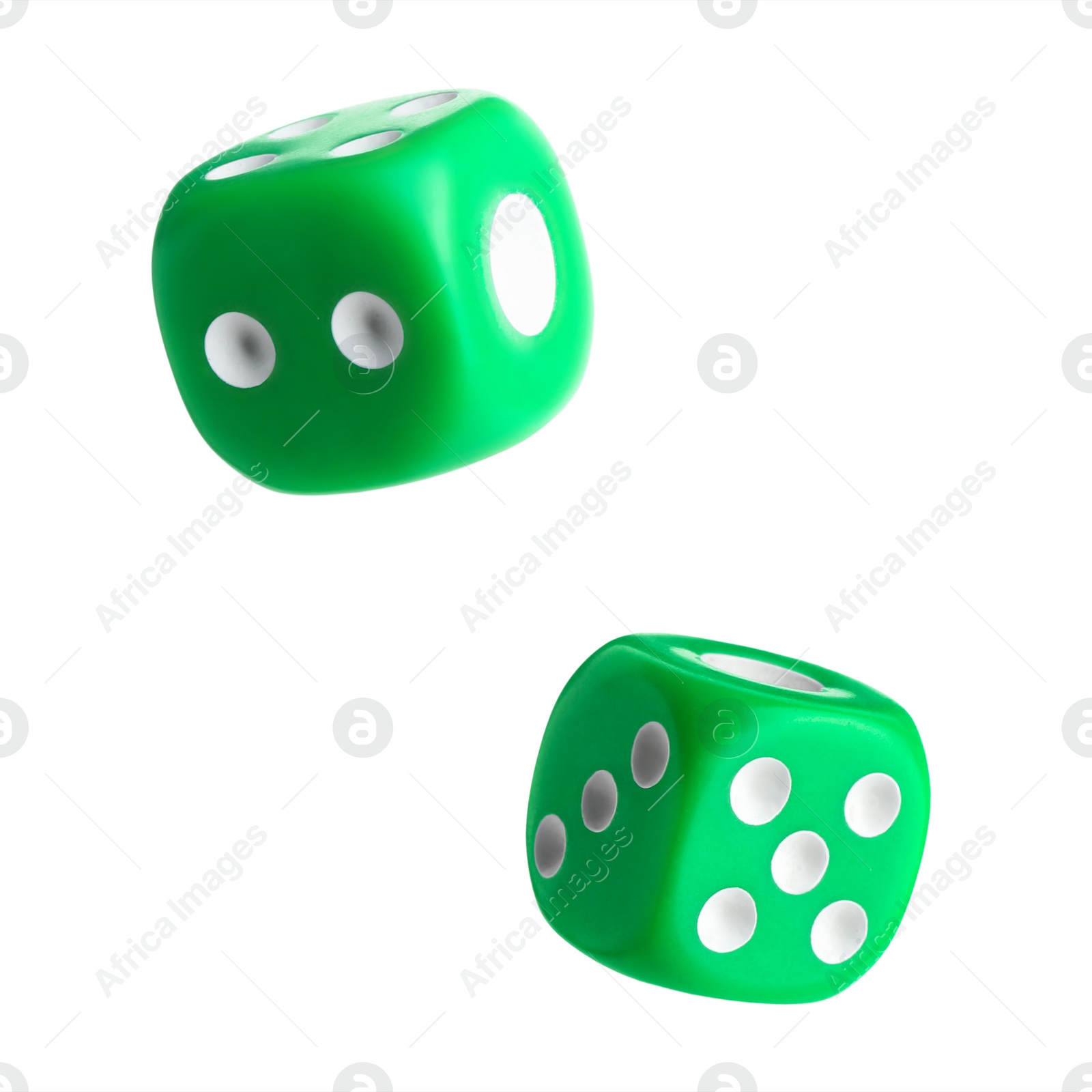 Image of Two green dice in air on white background