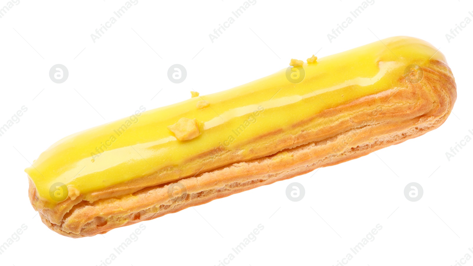 Photo of Delicious eclair covered with yellow glaze isolated on white