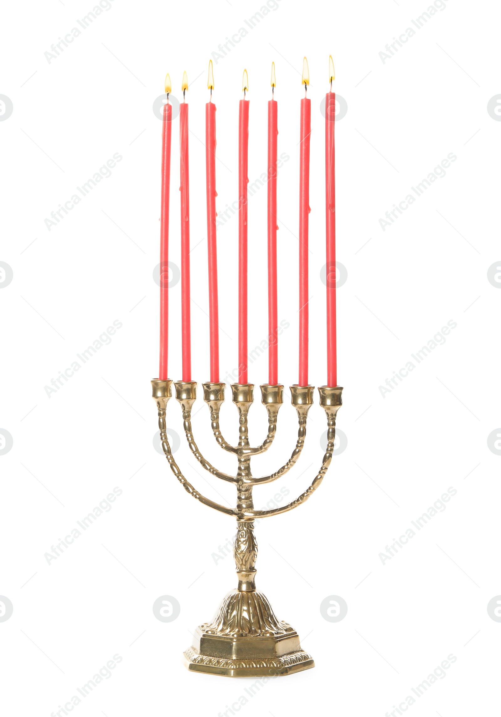 Photo of Golden menorah with burning candles on white background