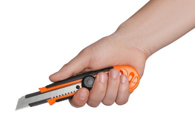 Man holding utility knife on white background, closeup