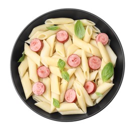 Photo of Tasty pasta with smoked sausage and basil in bowl isolated on white, top view