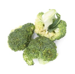 Cut green cauliflowers on white background, top view. Healthy food