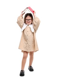 Cute little girl in glasses with open book on white background