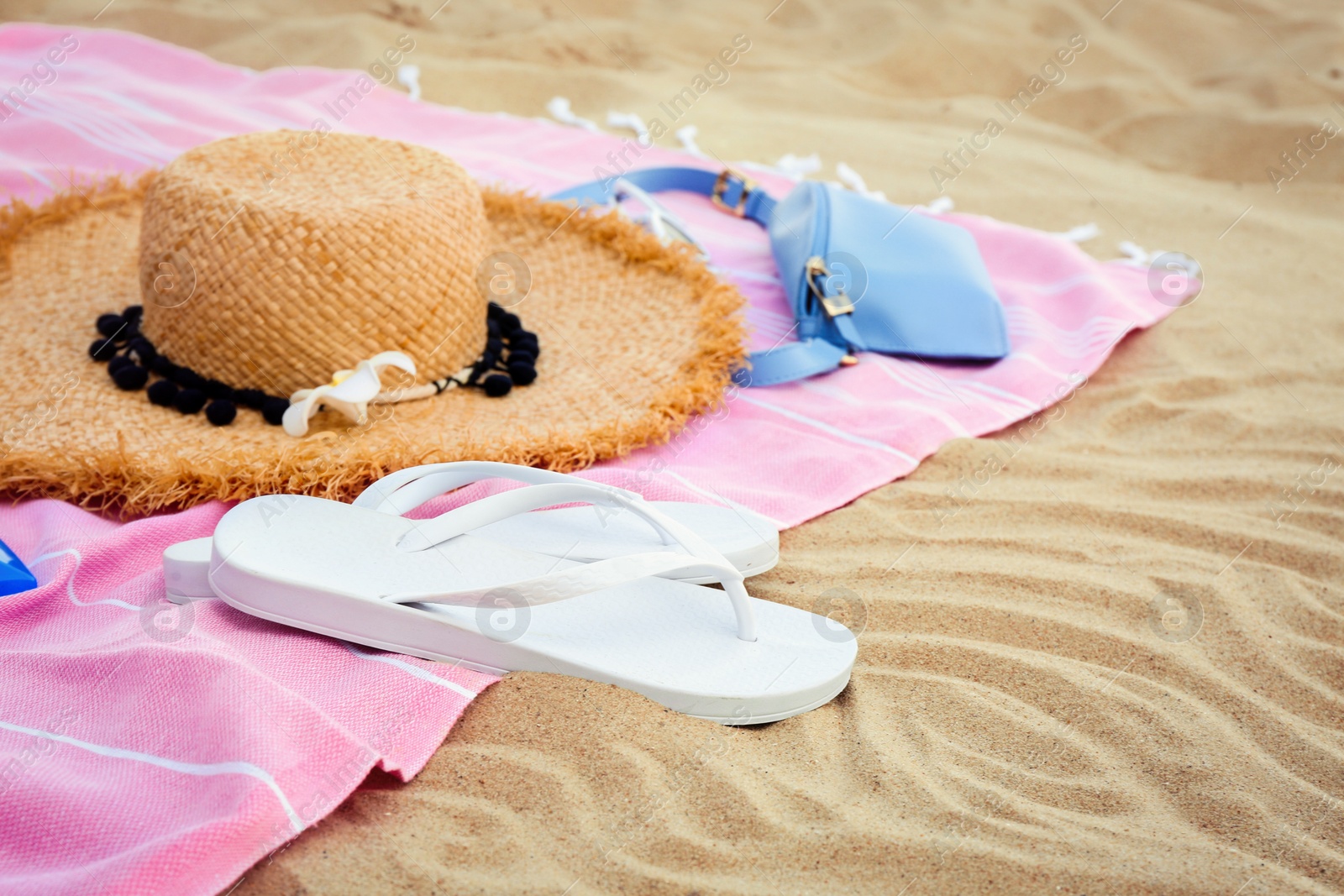 Photo of Composition with modern beach accessories on clean sand