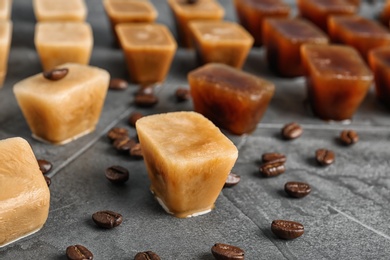 Composition with coffee ice cubes on grey table