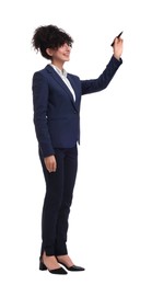 Photo of Beautiful businesswoman in suit with marker on white background