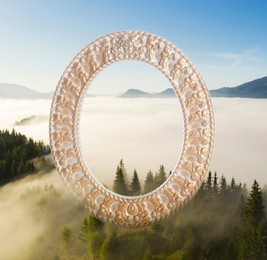 Image of Vintage frame and beautiful mountains covered with fog in morning