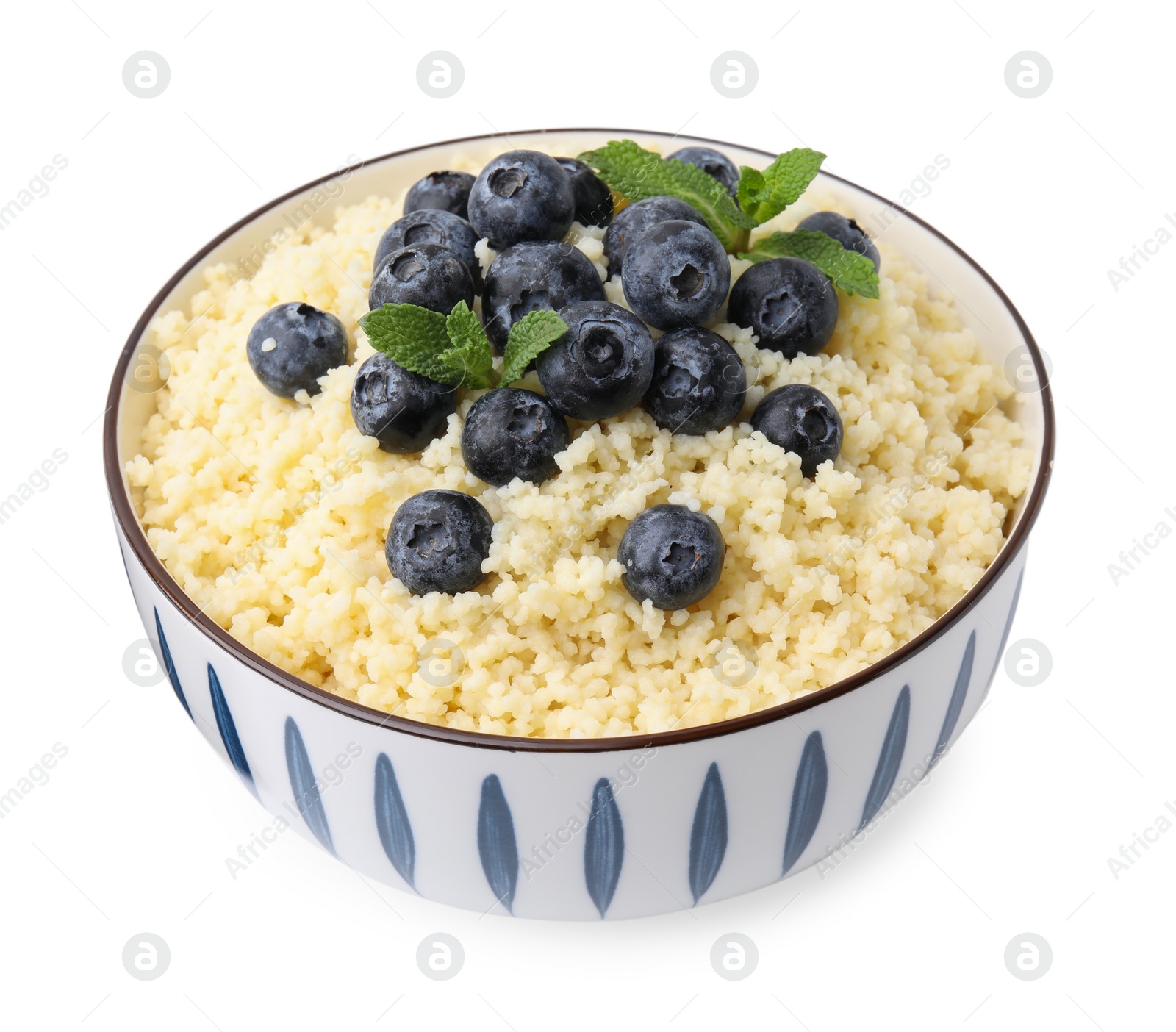 Photo of Bowl of tasty couscous with blueberries and mint isolated on white