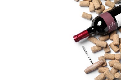 Photo of Corkscrew with wine bottle and stoppers on white background, top view