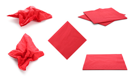 Image of Set with red paper napkins on white background