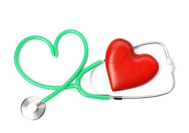 Photo of Red heart and stethoscope on white background, top view. Cardiology concept