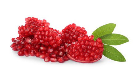 Photo of Pieces of tasty ripe pomegranate and leaves on white background