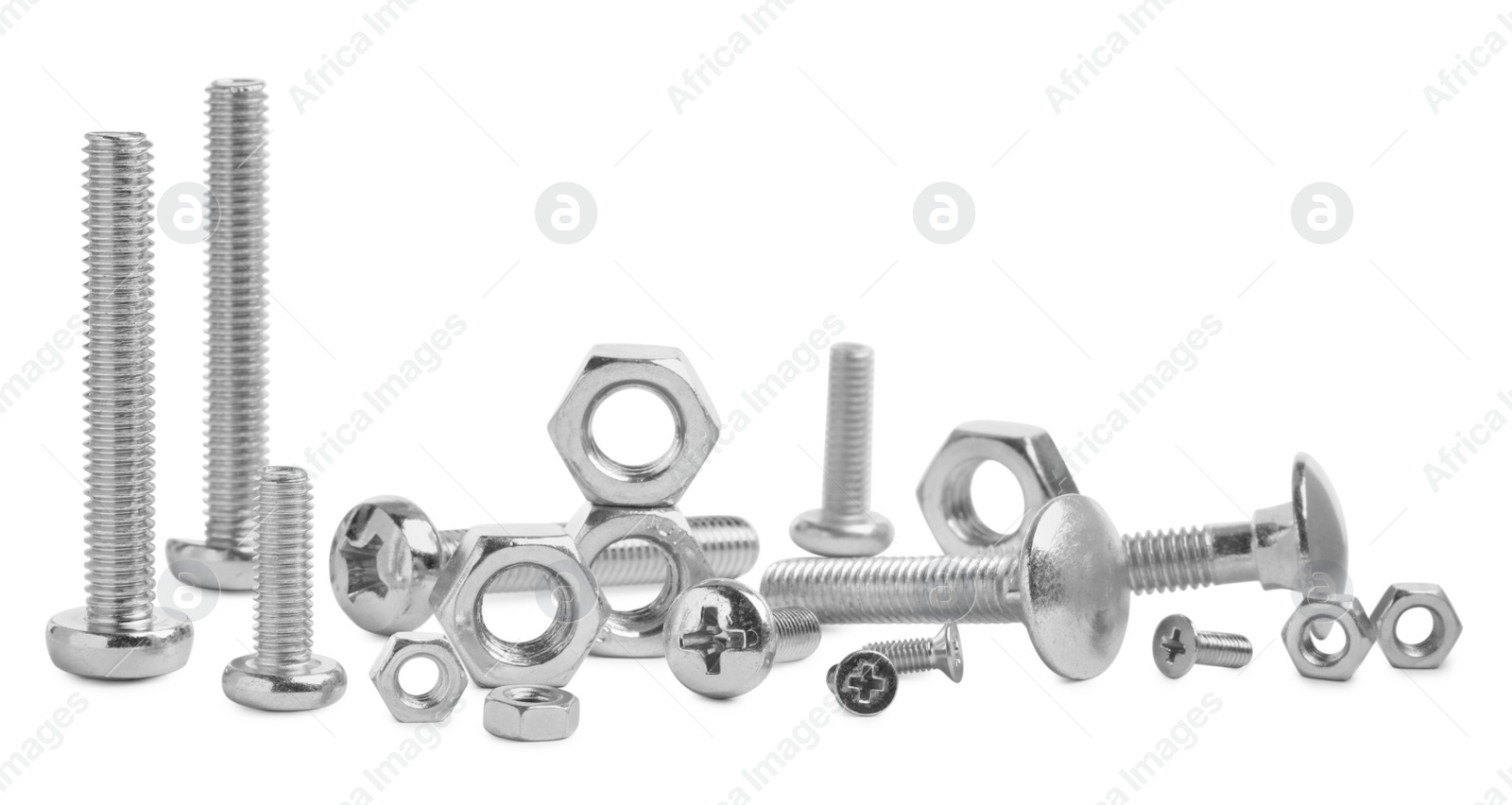 Photo of Different metal bolts and nuts on white background