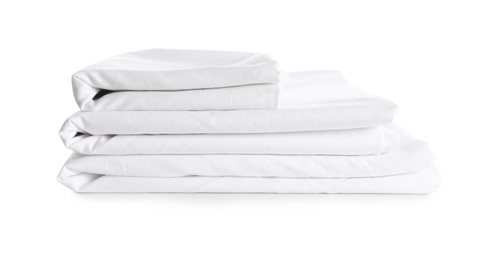 Photo of Stack of clean bed linen isolated on white