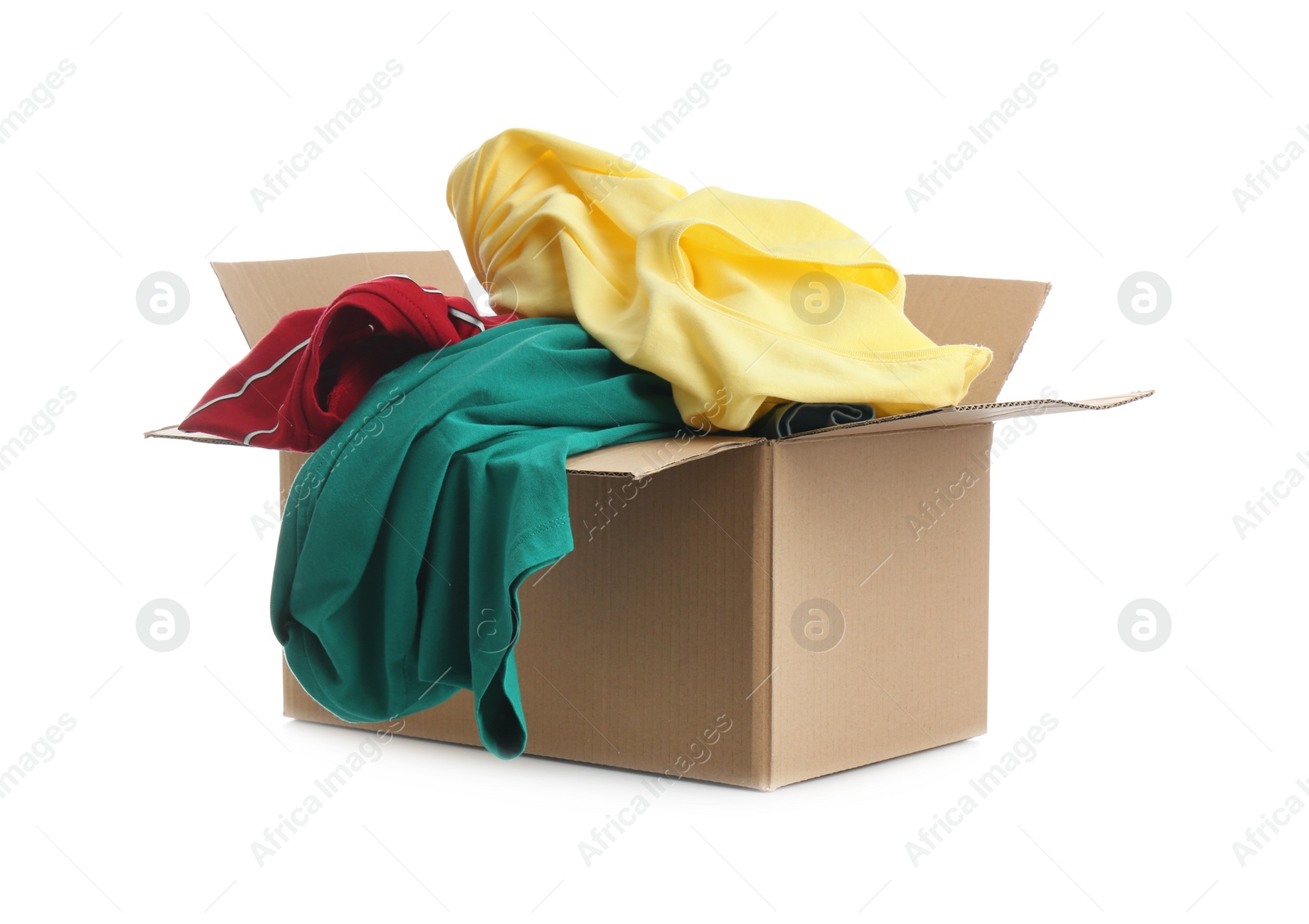 Photo of Cardboard box with clothes isolated on white