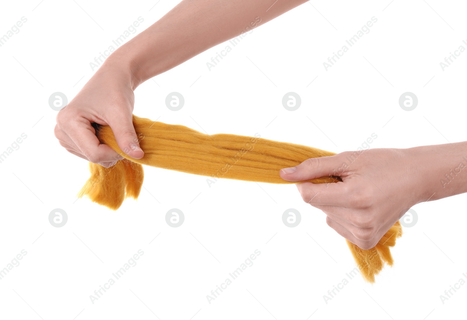 Photo of Woman holding orange felting wool on white background, closeup