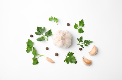 Photo of Flat lay composition with green parsley, pepper and garlic on white background