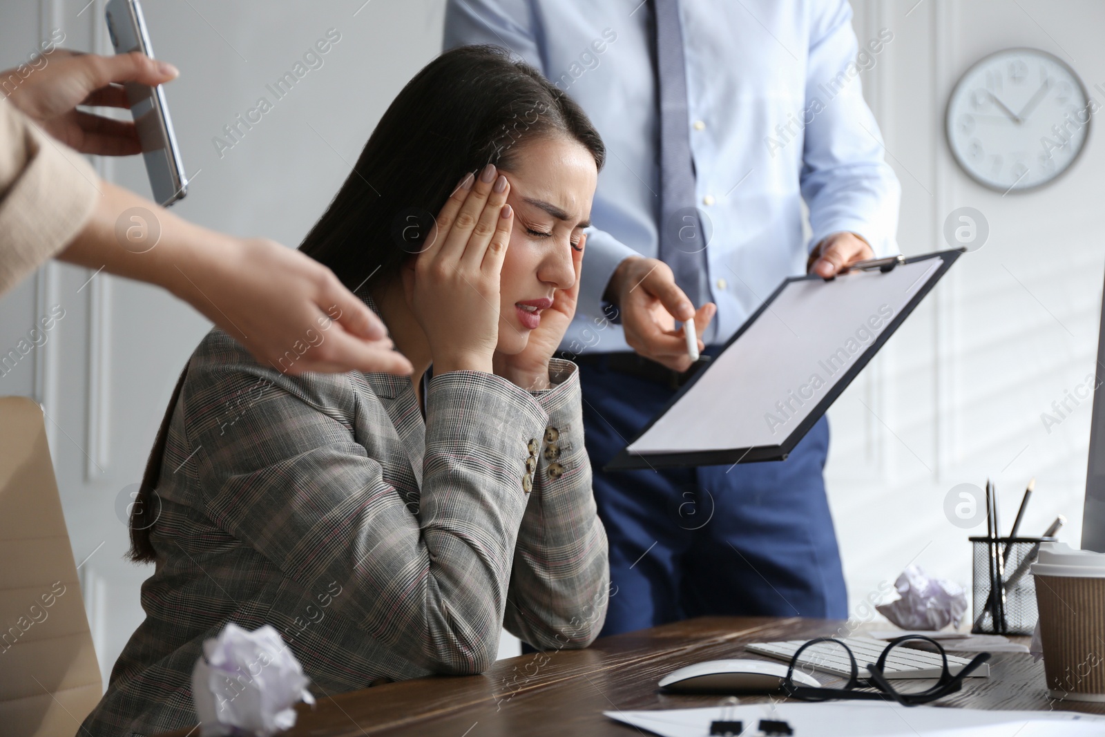 Photo of Businesswoman stressing out at workplace in office