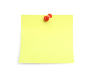 Blank yellow note pinned on white background, top view