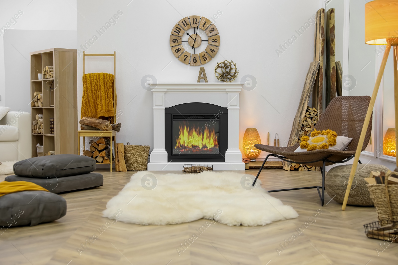 Photo of Elegant fireplace with burning flame in contemporary room interior