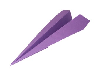 Photo of Handmade purple paper plane isolated on white