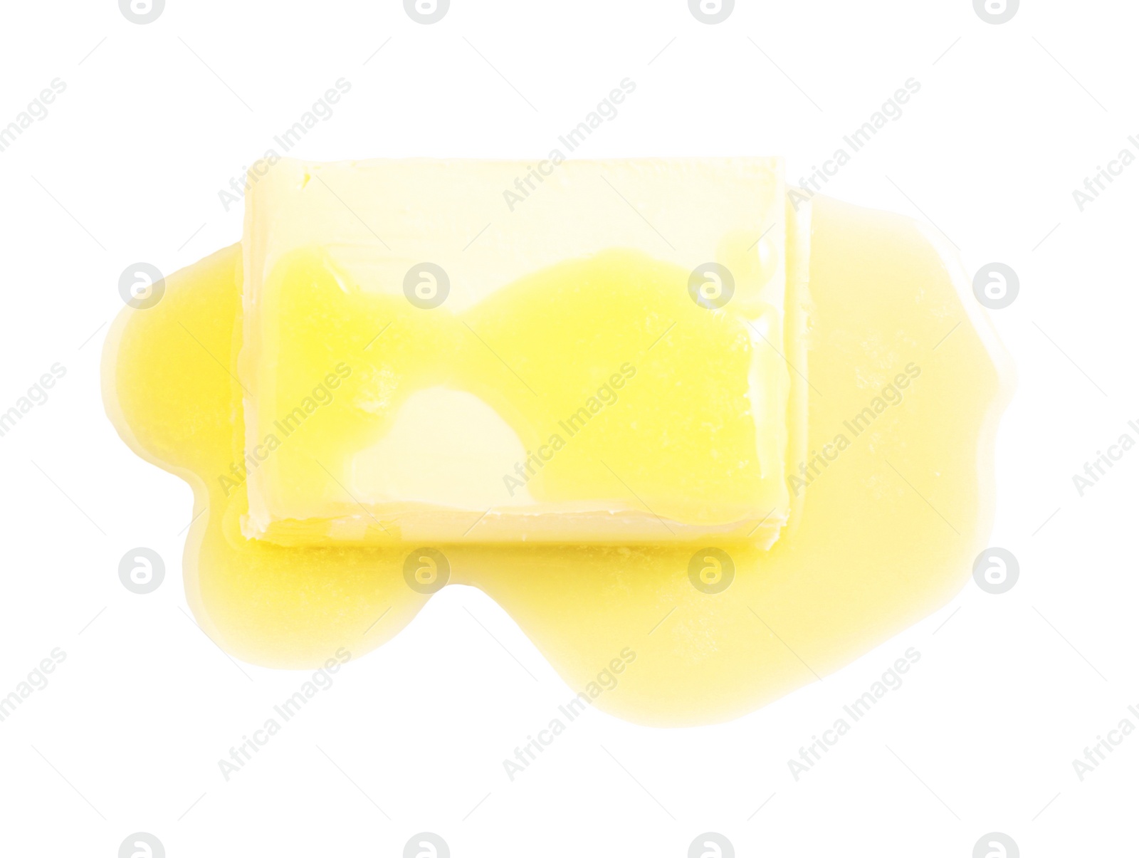 Photo of Piece of melting butter on white background, top view