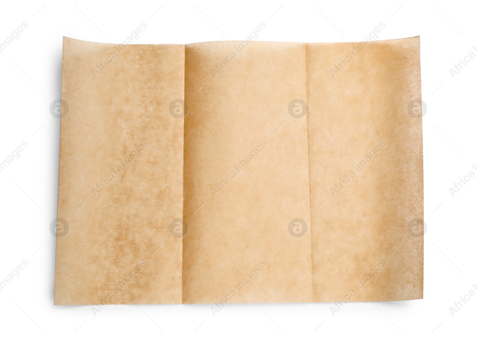 Photo of Sheet of brown baking paper on white background, top view