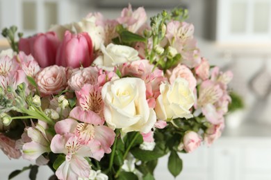 Photo of Beautiful bouquet of fresh flowers indoors, closeup