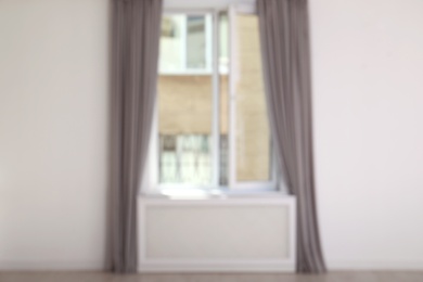 Modern window with curtains in room. Home interior