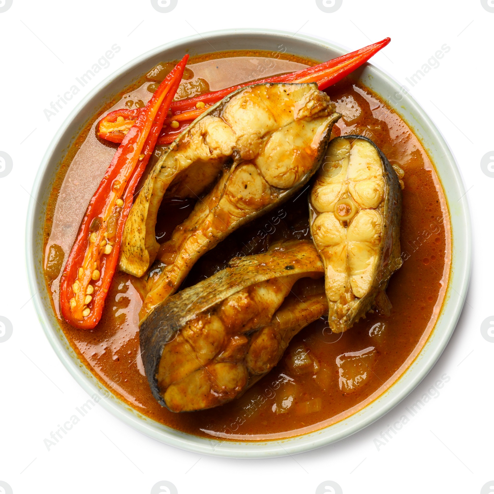 Photo of Tasty fish curry on white background, top view