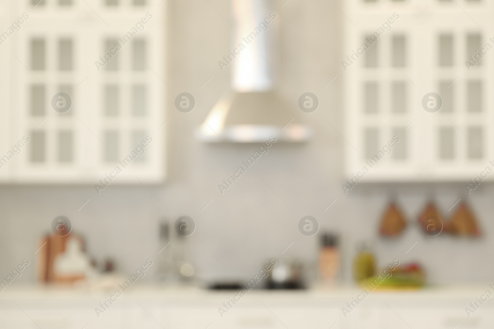 Photo of Blurred view of modern kitchen. Interior design