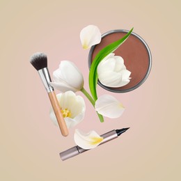 Spring flowers and makeup products in air on dark beige background