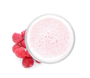 Photo of Tasty fresh milk shake with raspberries on white background, top view