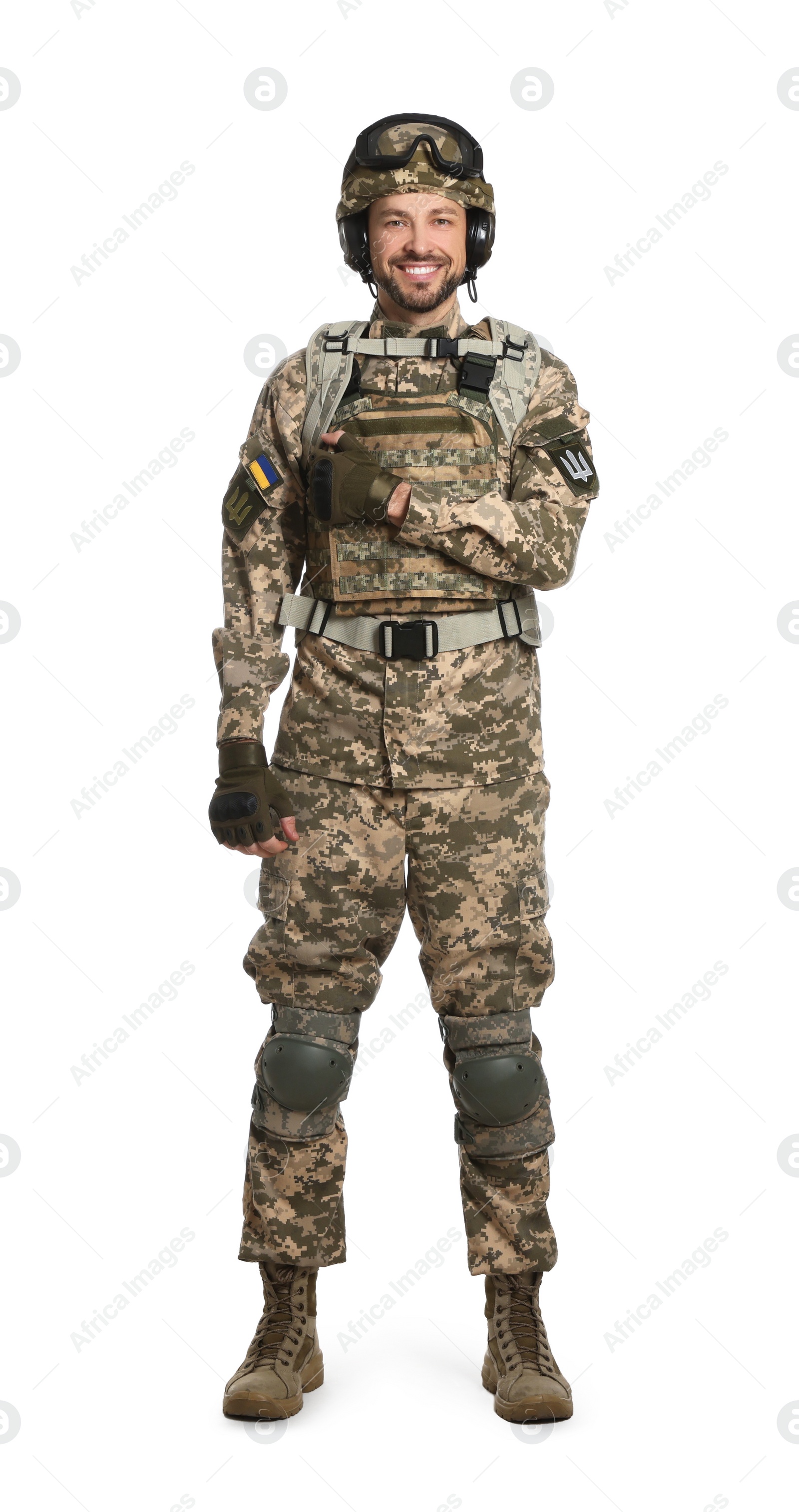 Photo of Soldier in Ukrainian military uniform with tactical goggles and headphones on white background