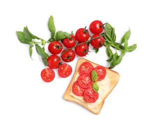 Delicious toast with butter, tomatoes and basil isolated on white, top view