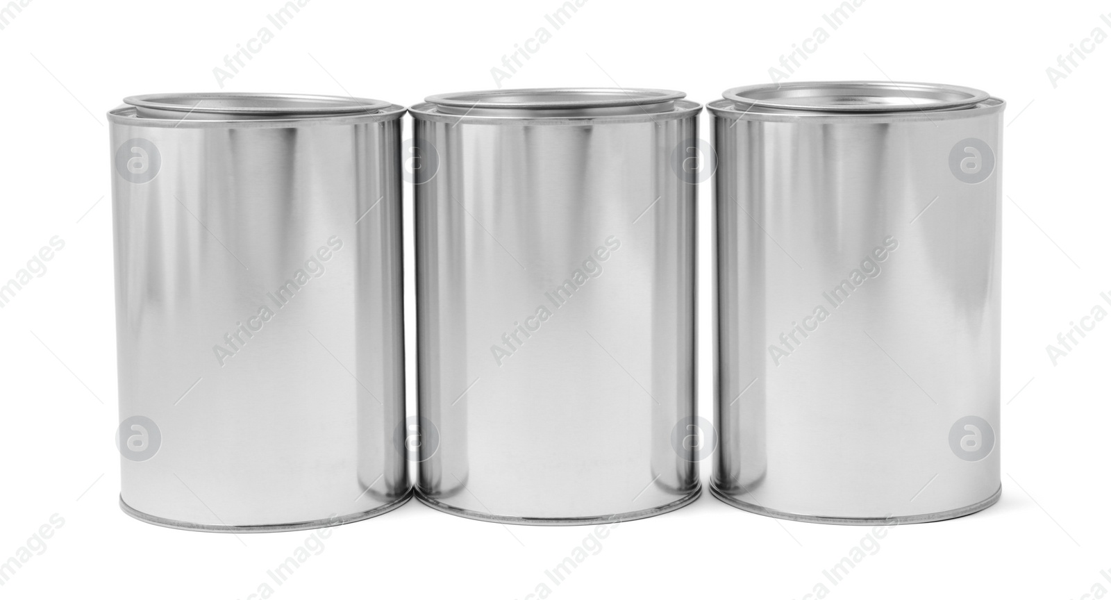 Photo of Many cans of paints on white background