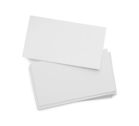 Photo of Blank business cards isolated on white, top view. Mockup for design