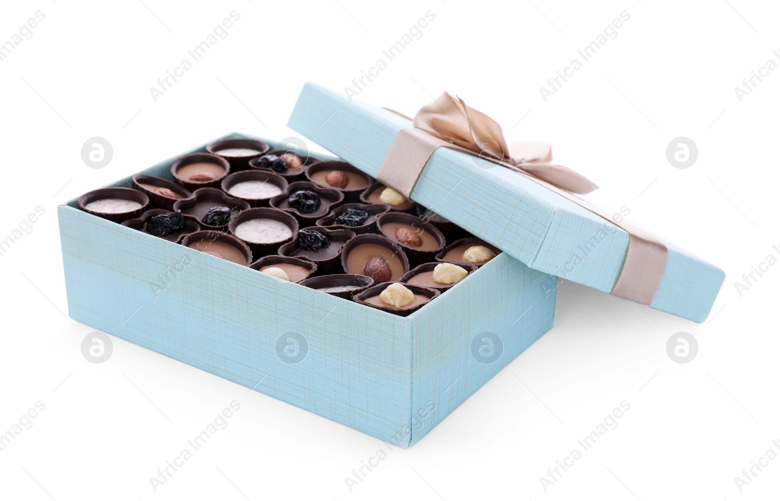 Photo of Box of delicious chocolate candies isolated on white