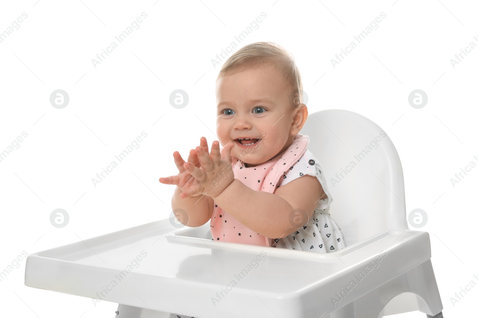 Photo of Cute little baby wearing bib in highchair on white background