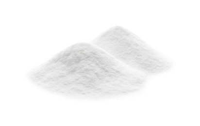 Photo of Piles of baking soda isolated on white