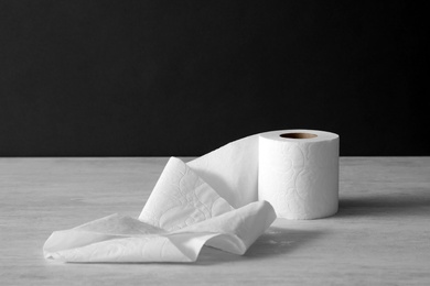 Photo of Soft toilet paper roll on light table