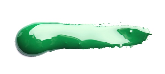 Abstract brushstroke of green paint isolated on white