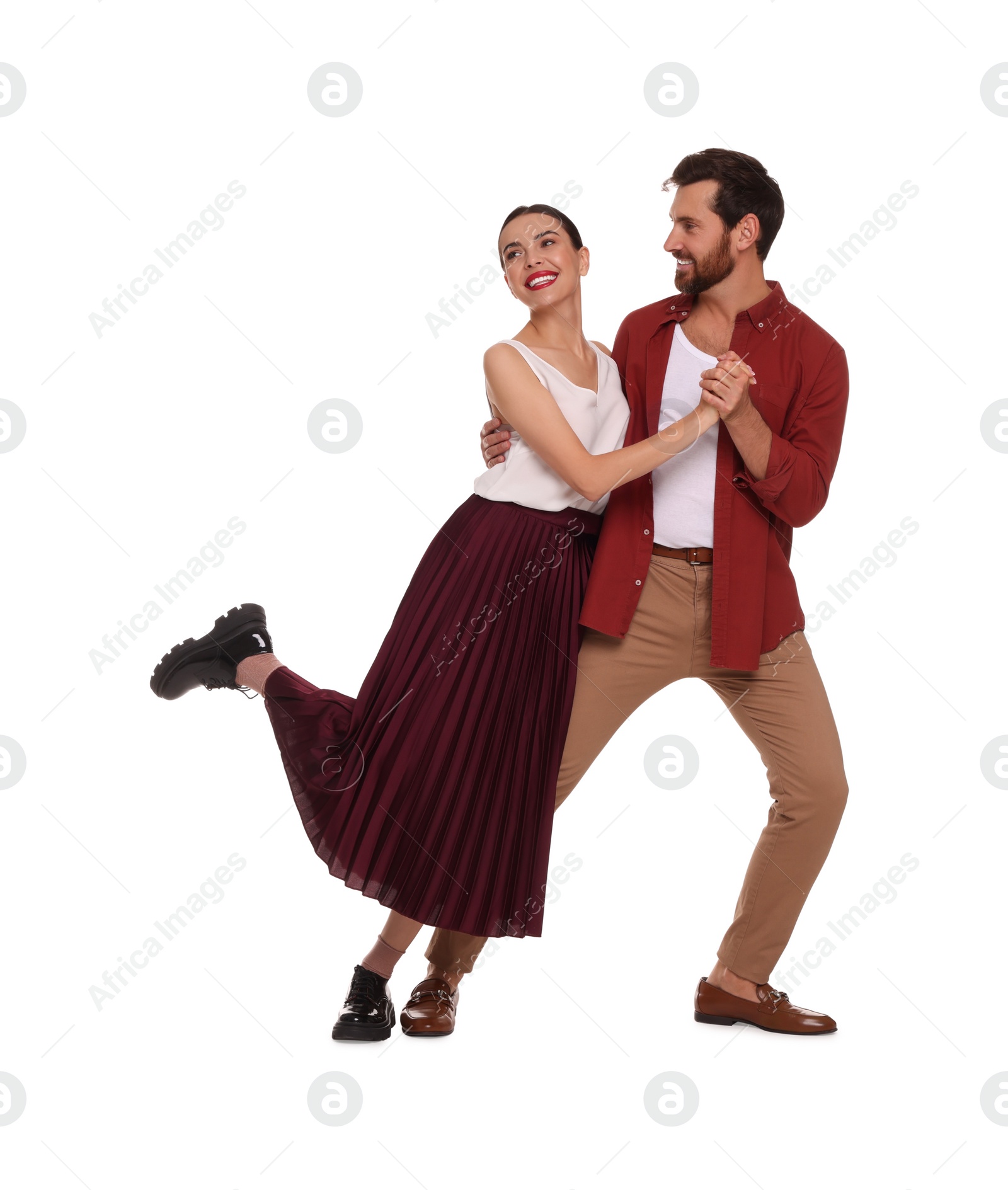 Photo of Happy couple dancing together on white background