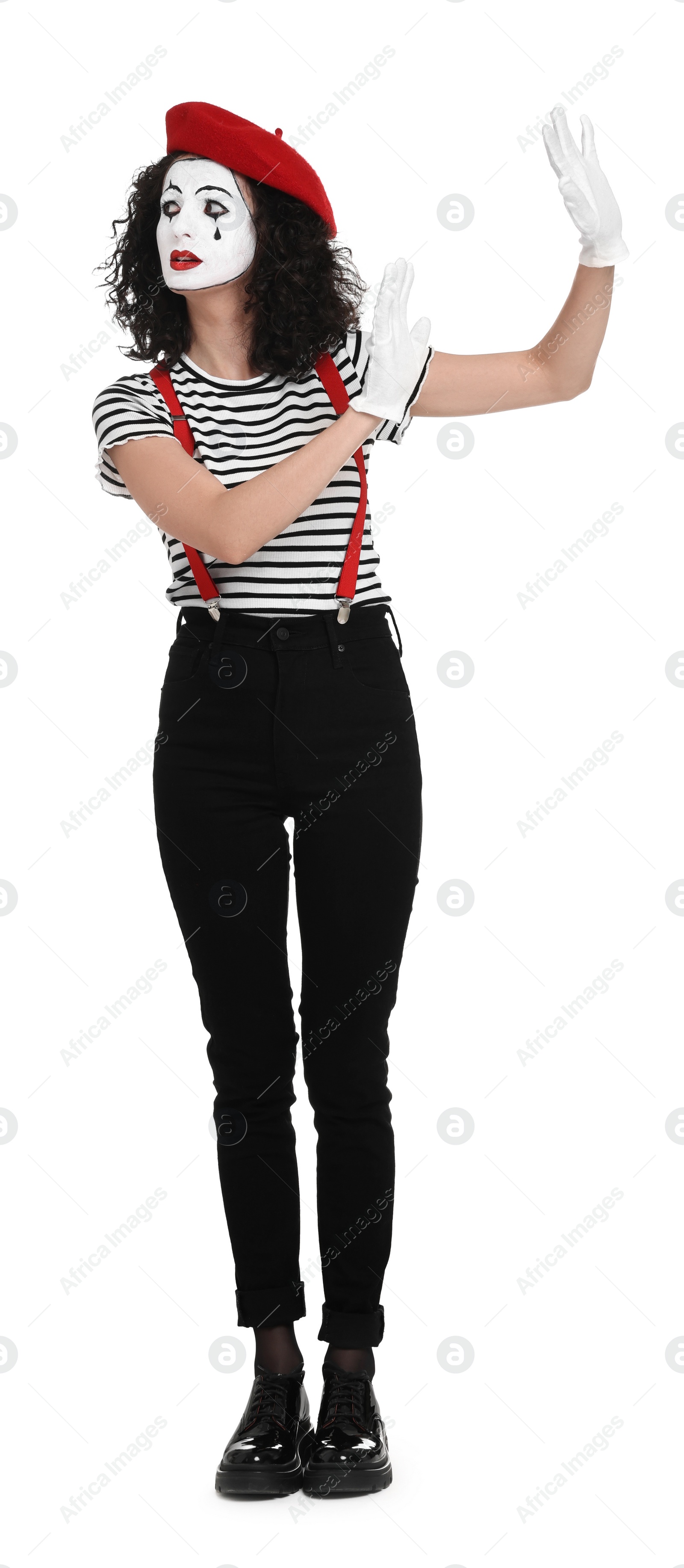 Photo of Funny mime with beret posing on white background