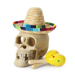 Photo of Human scull with Mexican sombrero hat and maracas isolated on white