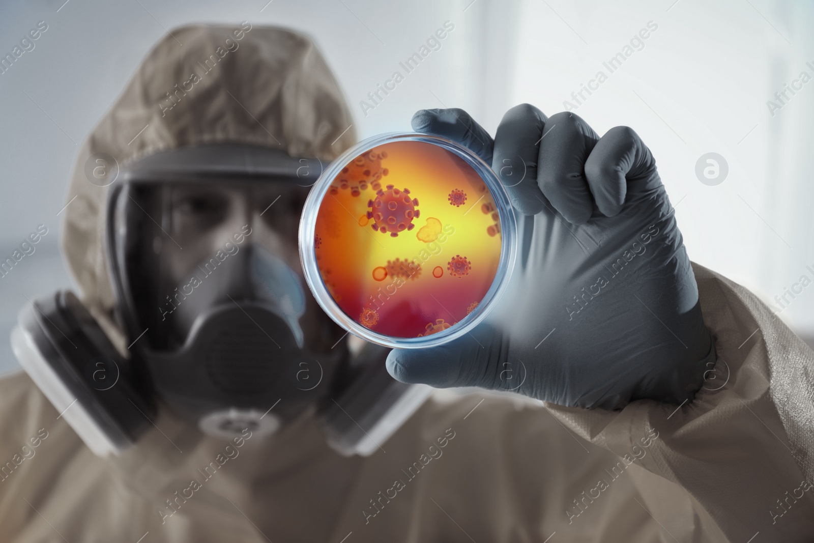 Image of Scientist in chemical protective suit with Petri dish in laboratory. Monkeypox virus