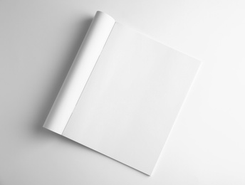 Photo of Blank book on white background, top view. Mock up for design